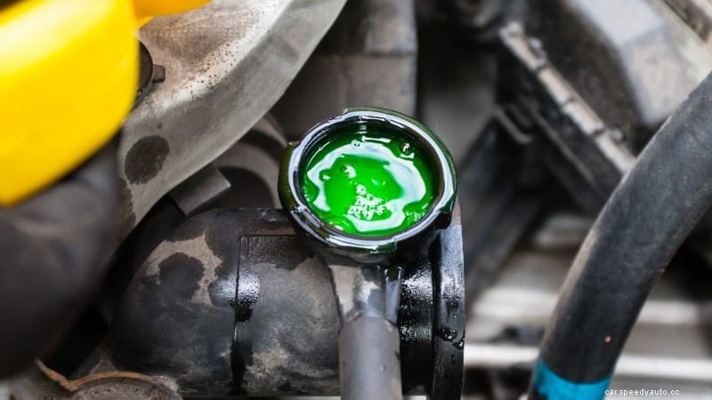 What causes Oil in Coolant Reservoir?