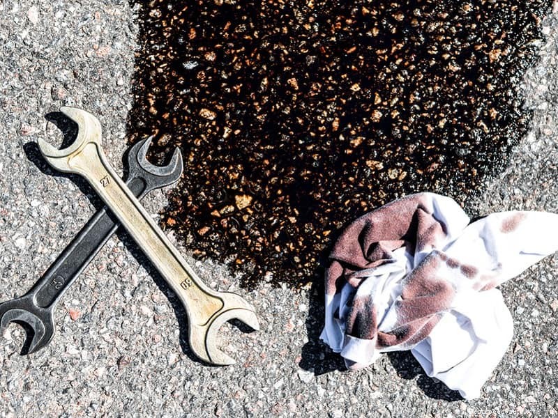 Why Is Pink Fluid Leaking From My Car? What Should I Do?