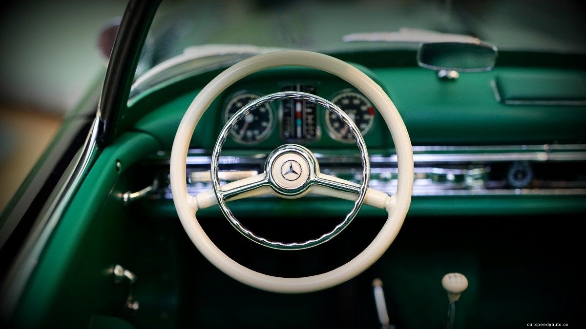 Why Don’t Modern Cars Have the 2 Spoke Steering Wheel?