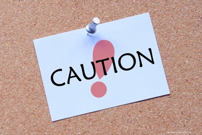 What causes black or white smoke to come from a diesel car’s exhaust?