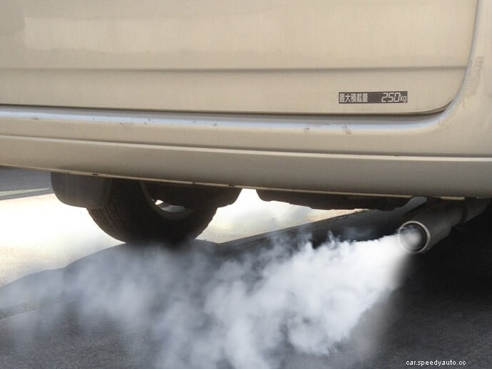 What causes black or white smoke to come from a diesel car’s exhaust?