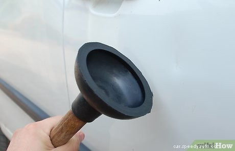 How to Remove Small Dents from a Car Body