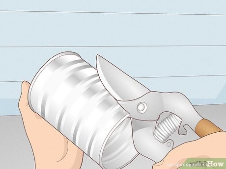 How to Repair an Exhaust Pipe with a Tin Can