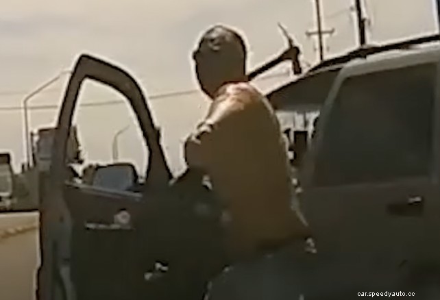 Watch as Road Rager Chucks a Hammer at a Car