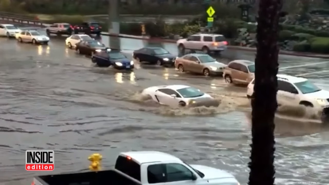 Watch a $200,000 Lamborghini Gallardo Supercar Drive Through Flood Waters