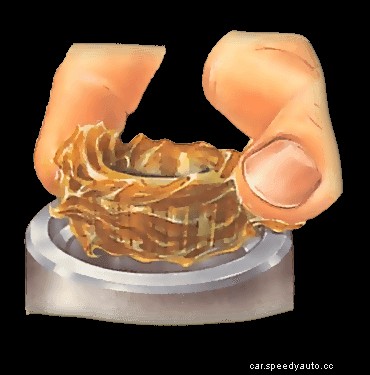 Lubricating and reassembling wheel bearings