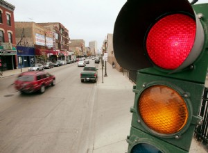 Why Do Some Drivers Hit the Roof of Their Car Going Through a Yellow Light?