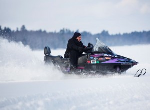When Is It Safe to Drive a Snowmobile Over a Frozen Lake?