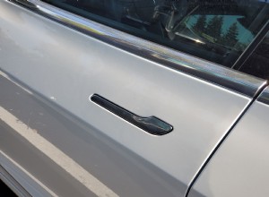 How Do You Open a Tesla Door When It’s Covered in Ice?