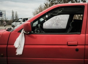 What Does a White Towel or Bag on a Broken-Down Car Mean?