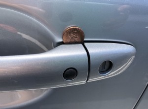 What Does a Coin in a Car Door Handle Mean?